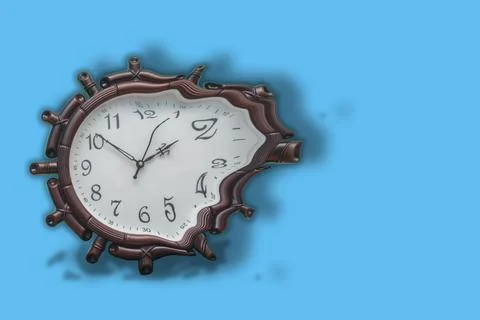 Melting effect of a wall clock. Stock Photos