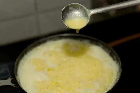 Melting Ghee in Pan Stock Photos