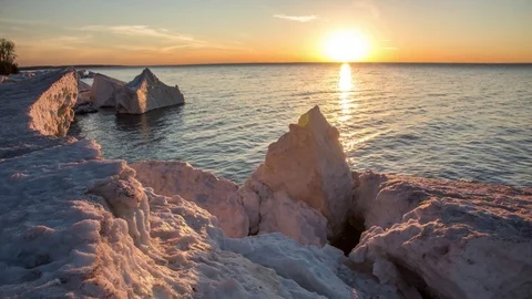 Melting ice blocks and sunset Stock Footage 72916117