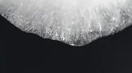 Melting Ice Closeup On Black Background Stock Footage