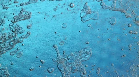 Melting ice closeup on blue background Stock Footage 10565965