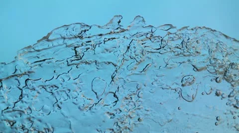 Melting ice closeup on blue background Stock Footage 10574918