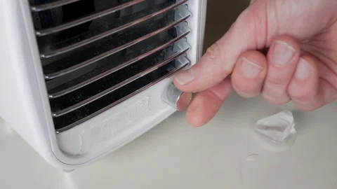 Melting ice cube near white ventilation appliance. Stock Footage 341530351