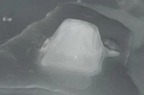 Melting ice cube Stock Photos