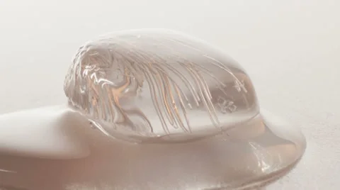 Melting ice cube time lapse Video stock 39582460