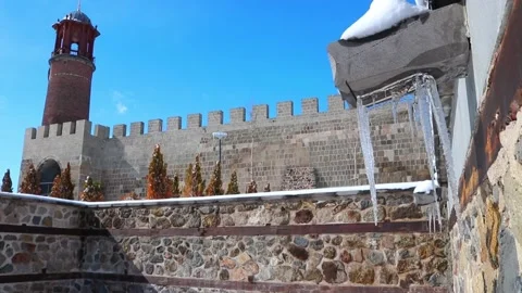 Melting Ice Formations and Snow around Erzurum Castle on a Sunny Spring Day Stock Footage 239837732