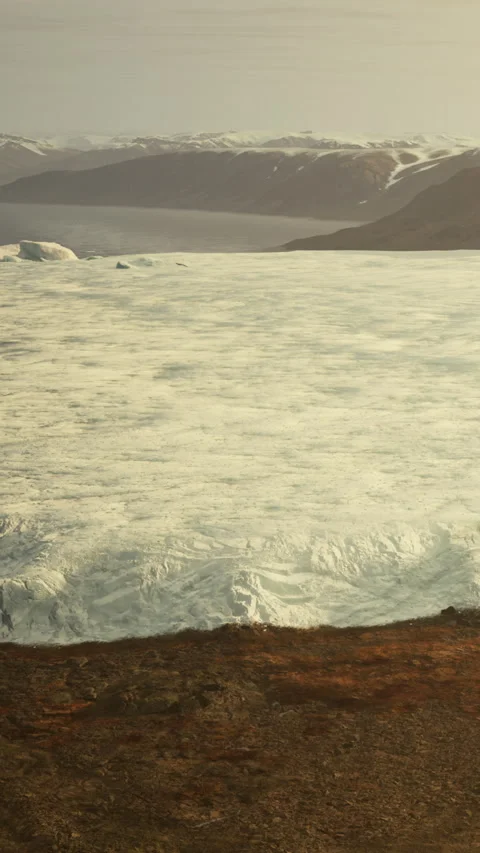 Melting ice on a glacier in a remote location during daylight hours Stock Footage 341964034