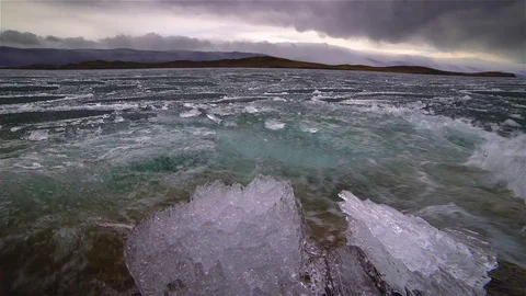 Melting of ice on the lake Stock Footage 77175273