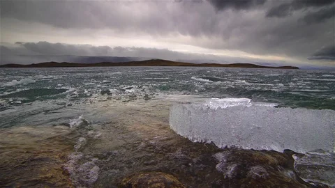 Melting of ice on the lake Stock Footage 77525160