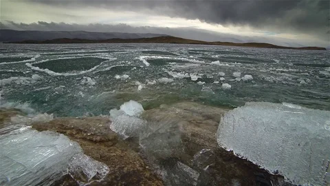 Melting of ice on the lake Stock Footage 77663280