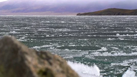 Melting of ice on the lake Stock Footage 77853259