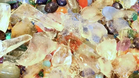 Melting ice opening view to precious natural gemstones zoom Video stock 76157774