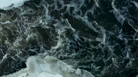 Melting ice on river in winter. Ice is melting on the lake in winter. 스톡 동영상 165347183