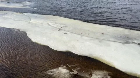 Melting Ice Sheet on Arctic Shoreline Stock Footage 280987547