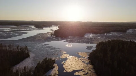 Melting ice sunset backwards overfly aerial hyperlapse Stock Footage 98307046