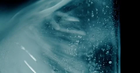 Melting Ice Under a Microscope 스톡 동영상 293811369