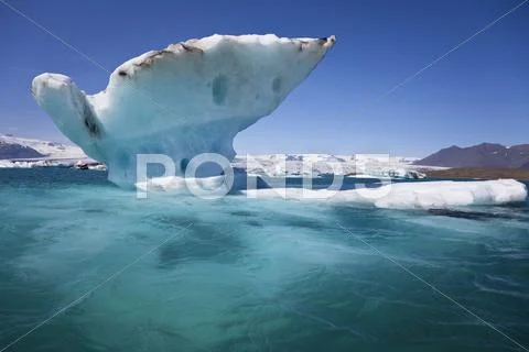 Melting iceberg on the lagoon, jokulsarlon, iceland Stock Photos