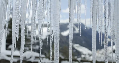 Melting icicles in high temperature in winter Global warming causing melting Stock Footage 127187199