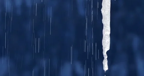 Melting icicles isolated against dark background. Stock Footage 264803802