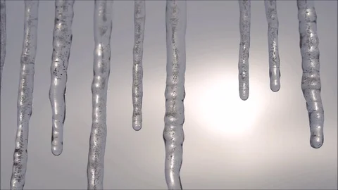 Melting the icicles in rays of sunlight Stock Footage 71369024