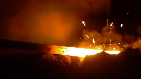 Melting metal at a foundry Stock Footage 90934586