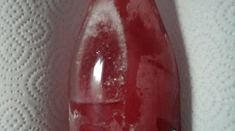 Melting red ice 스톡 동영상 34095127