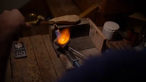 Melting Silver with a blowtorch Stock Footage 145921704