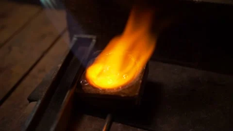 Melting Silver with a blowtorch Stock Footage 145921764
