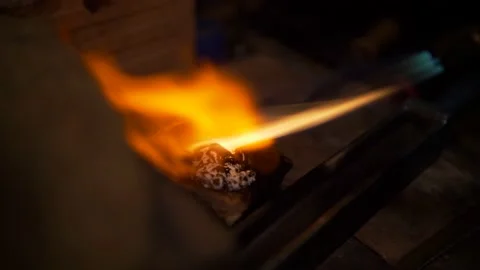 Melting Silver with a blowtorch Stock Footage 145921812