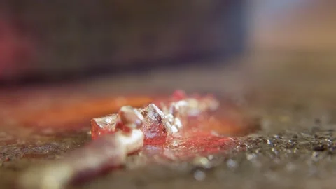 Melting silver close-up Stockbeeldmateriaal 318156877