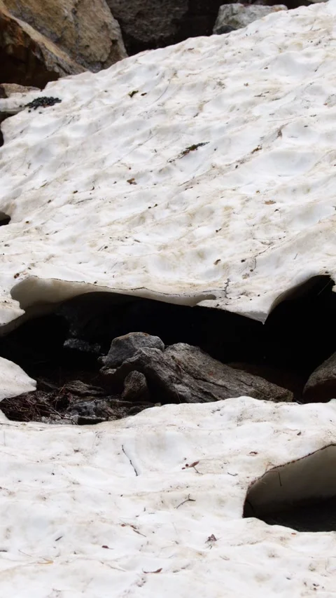 Melting Snow and Flowing Stream at Lago della Rovina Stock Footage 341536490