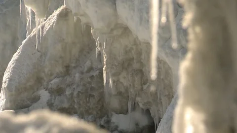 Melting snow and icicles in spring Stockbeeldmateriaal 105177320