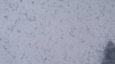 Melting snow and irregular ice patterns on a windowpane Stock Footage 331723169