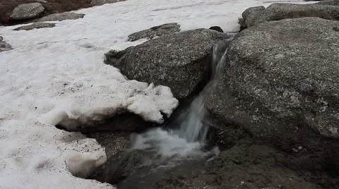 Melting snow on mountain Video stock 43330298