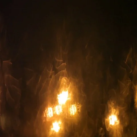 Melting snow runs down the windowpane on the eve of Christmas. Holiday relax. Stock Footage 69424077