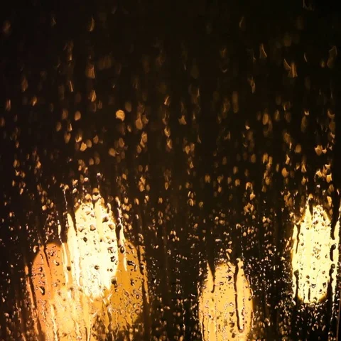 Melting snow runs down the windowpane on the eve of Christmas. Holiday relax. Stock Footage 69424207