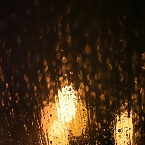 Melting snow runs down the windowpane on the eve of Christmas. Holiday relax. Stock Footage 69424329