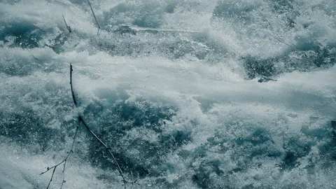 Melting snow in spring an old grass and leafs under it. Stock Footage 103490428