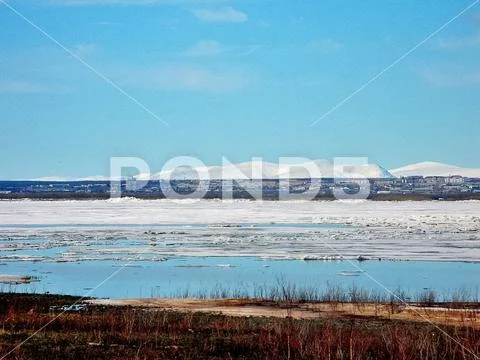 Melting snow in the spring. The spring heat will melt the snow. Stock Photos
