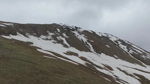 Melting Snow on Steep Mountain Slope in Almaty Stock Footage 345388295
