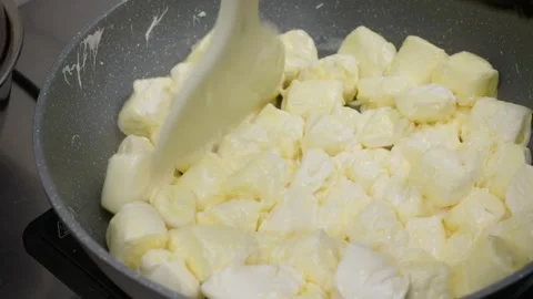 Melting White Marshmallows in a Pan for Homemade Dessert Pie Stock Footage 337751606