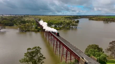 Melton, VIC, Australia - Sep 3, 2022 - Eureka Express Train crossing bridge Stock Footage