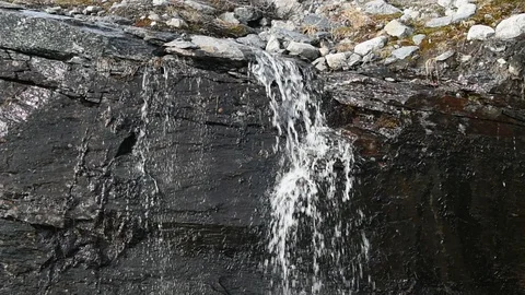 Meltwater on mountainside Stock Footage 92349790