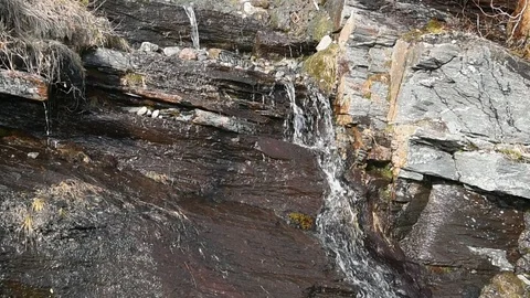Meltwater on mountainside Stock Footage 92349806