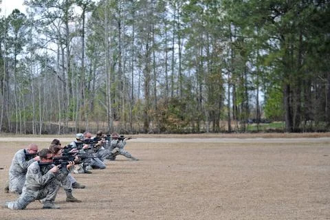 Members of the 1st Combat Camera Squadron participate in a live-fire train... 스톡 사진