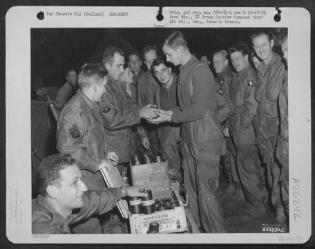 Members of the 9th Troop Carrier Command line up during distribution of am... Stock Photos
