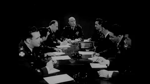 Members of the intelligence community negotiate security changes at Fort Bradley Video stock 95065865