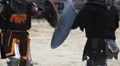 Members of knightly orders competing on battle field, martial skills tournament HD Footage