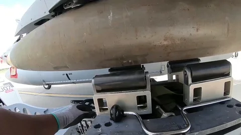 Members load MK-82 500 pound bomb in support of the live ammunition drops - 2018 Stock Footage 96494668