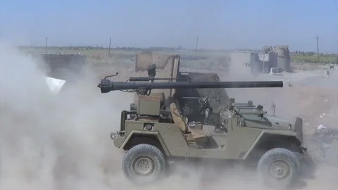 Members of Popular Mobilization Forces launch a missile, Samarra, Iraq Stock Footage 148899451